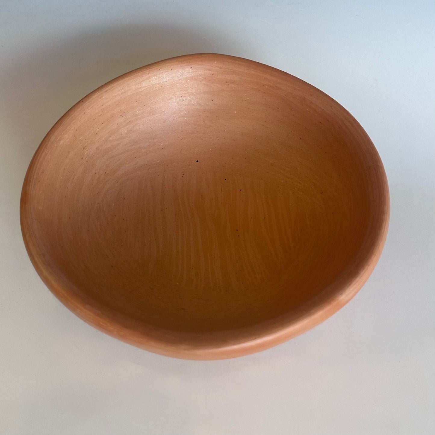 Oval clear clay bowl for everyday